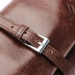 detalj kaiša i kopče na old fox torbici